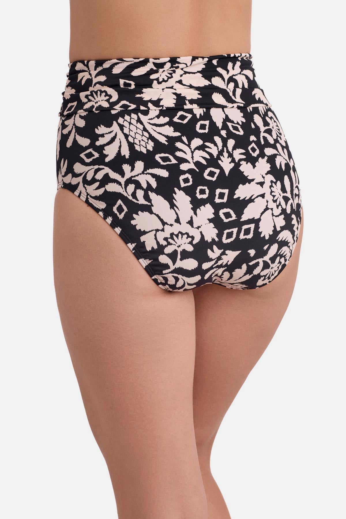 Back view of black and white palm tree printed high waisted swim bottoms