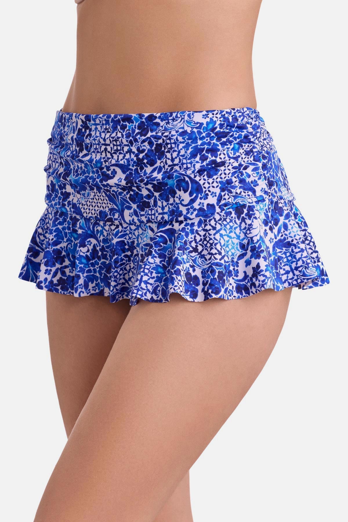 Side view of a blue and white floral printed skirted swim bottom