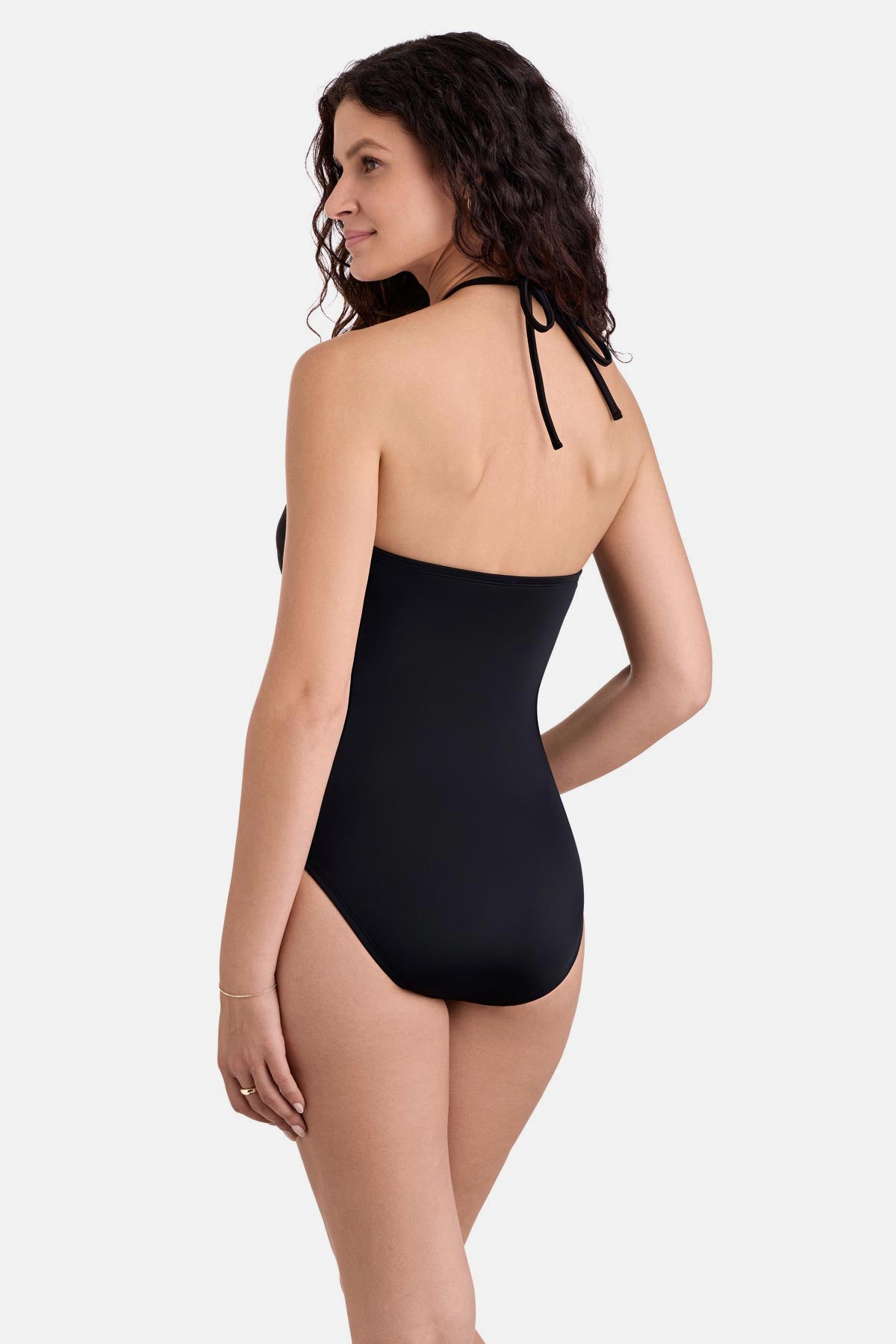 Woman turned left wearing a black one-piece halter bandeau swimsuit